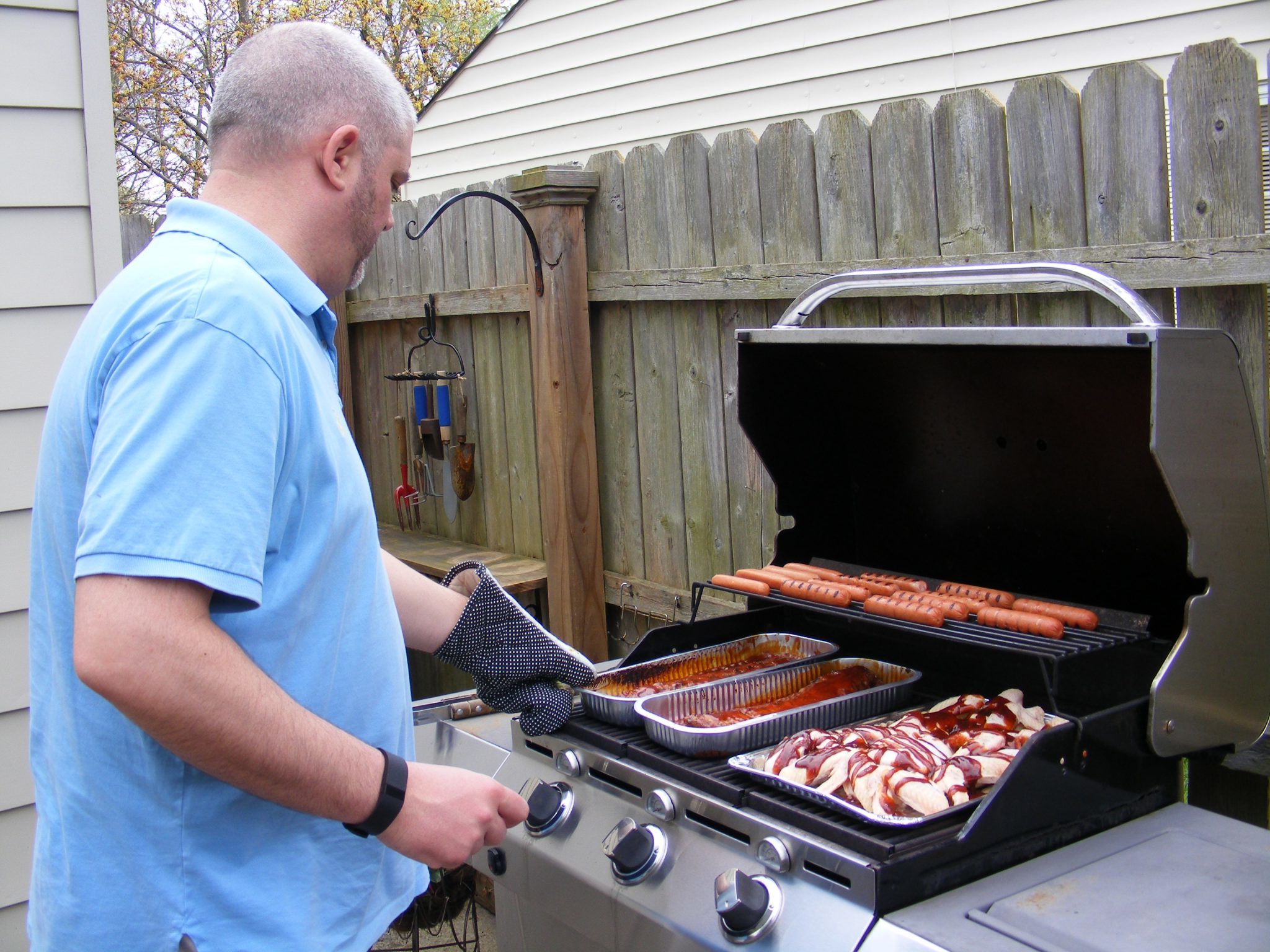 Alan cooking for the family in a gas smoker.