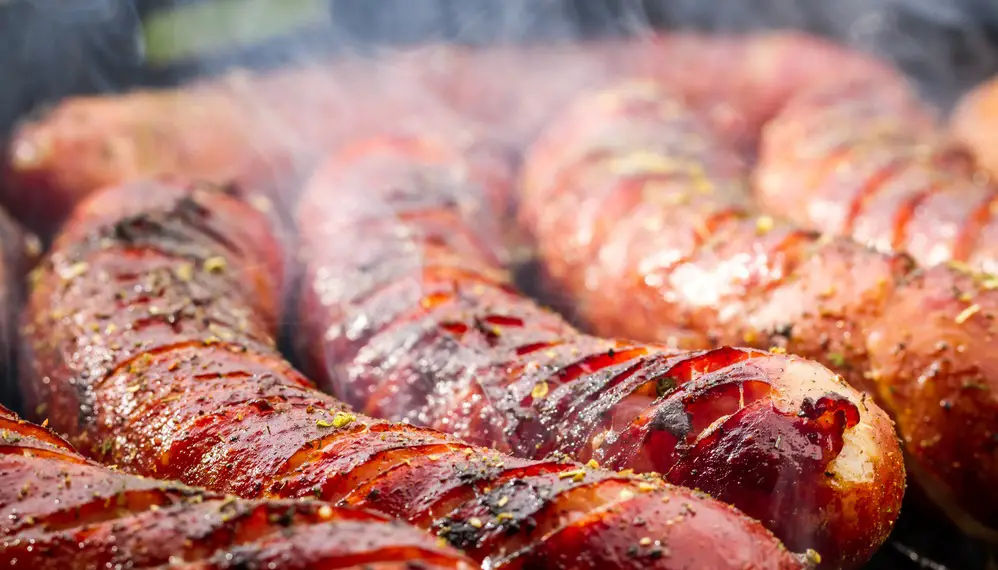 Closeup of sausage on the grill