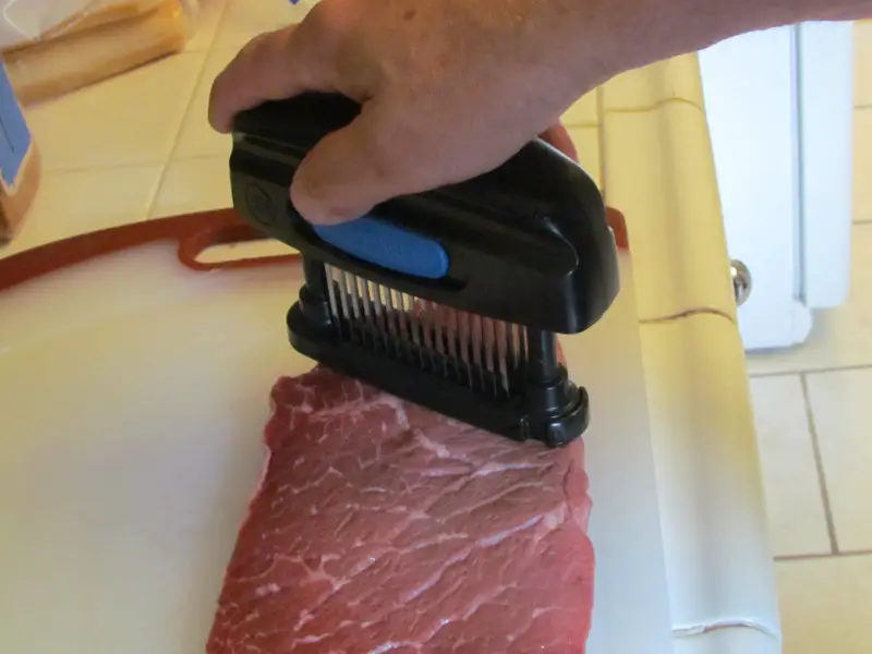 use a meat tenderizer tool to perforate across the grain