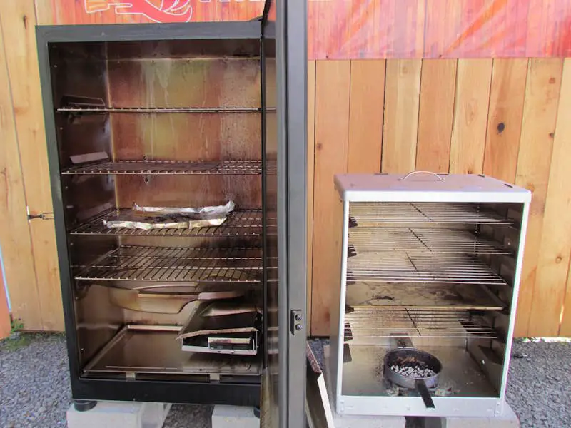A side-by-side look inside the big chief smoker and the masterbuilt smoker, photographed by pioneer smoke houses.