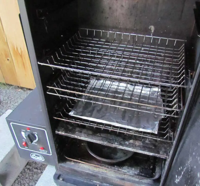 Four rows of meat were placed inside the Bradley Electric Smoker as part of a review being conducted by Pioneer Smoke Houses.