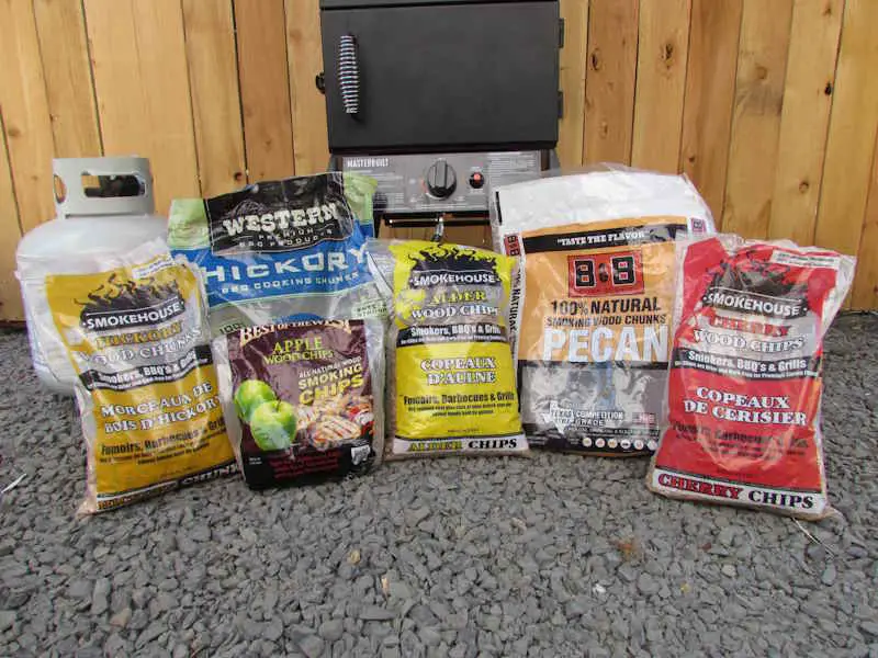 A variety of wood chips and chunks used in the Masterbuilt propane smoker